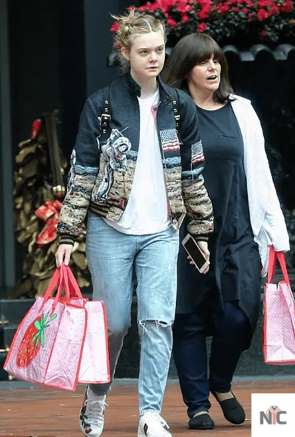 Elle Fanning Saint Laurent Moon Landing Black Varsity Jacket NYC Jackets