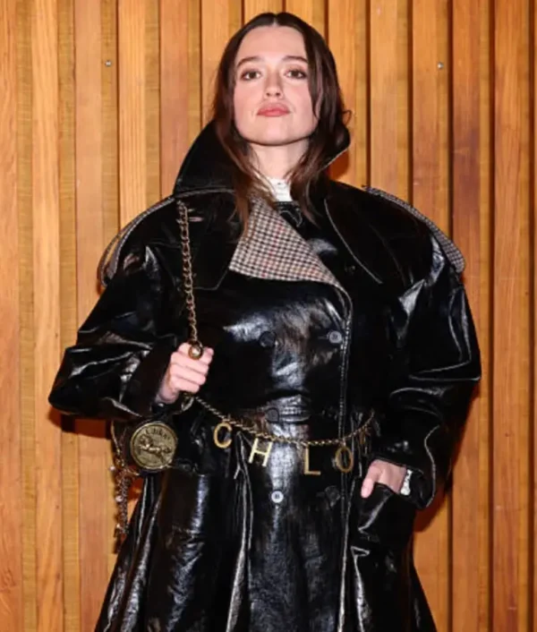 Aimee Lou Wood wearing a leather jacket at Paris Fashion Week with sleek tailored fit and modern design.