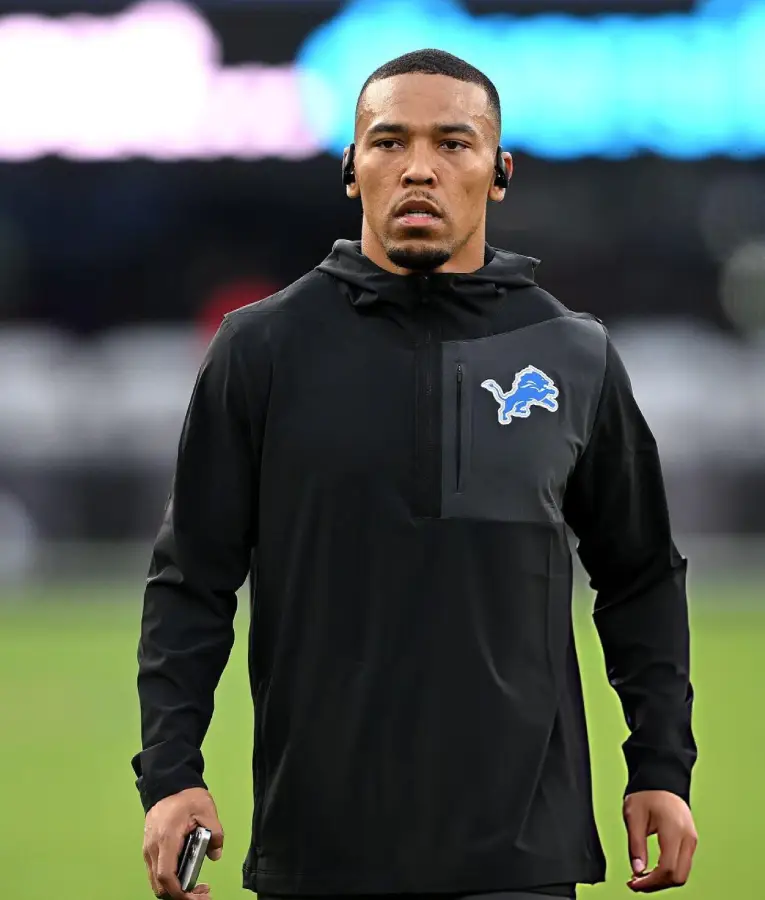 Amon-Ra St. Brown Detroit Lions black hoodie featuring team logo on the chest, adjustable hood, and casual athletic fit
