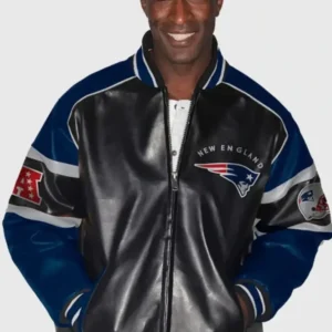 “England Patriots faux-leather jacket in black with team logo and classic athletic-inspired design.”