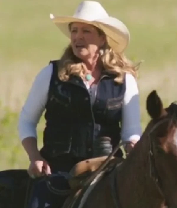 Heartland Season 19 Lisa Stillman dark wash denim vest with classic sleeveless design and casual fit.