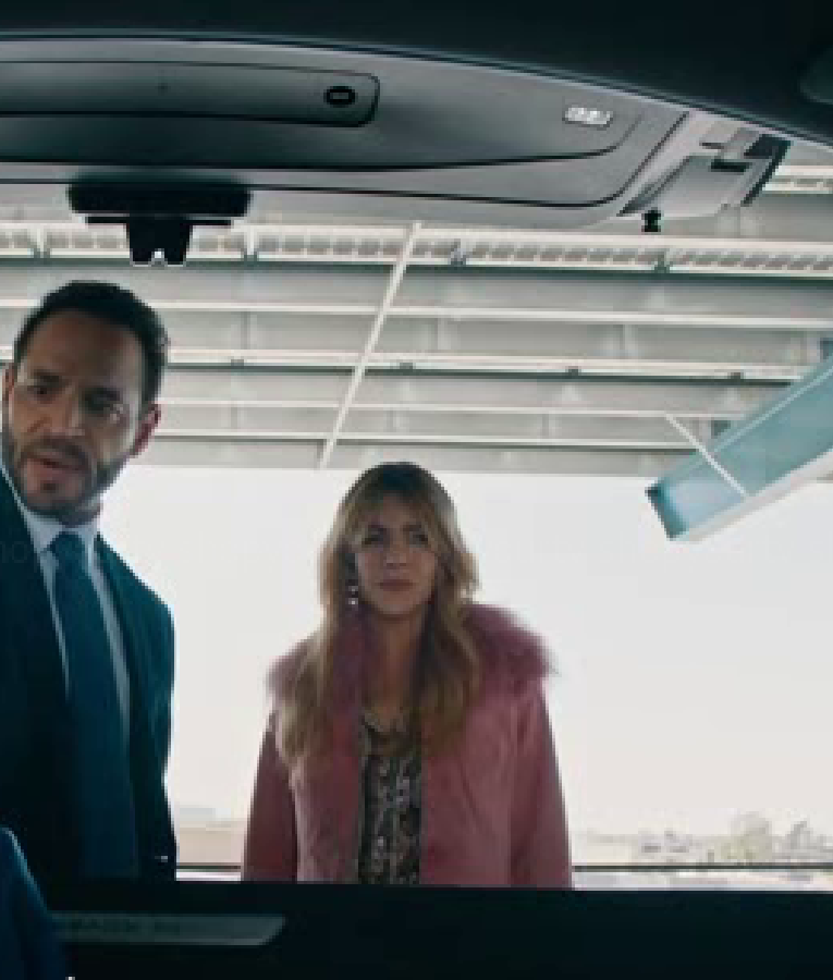 Morgan Gillory wearing a fur-collared jacket in High Potential Season 2, featuring a tailored fit, button closure, and luxurious fur trim around the collar