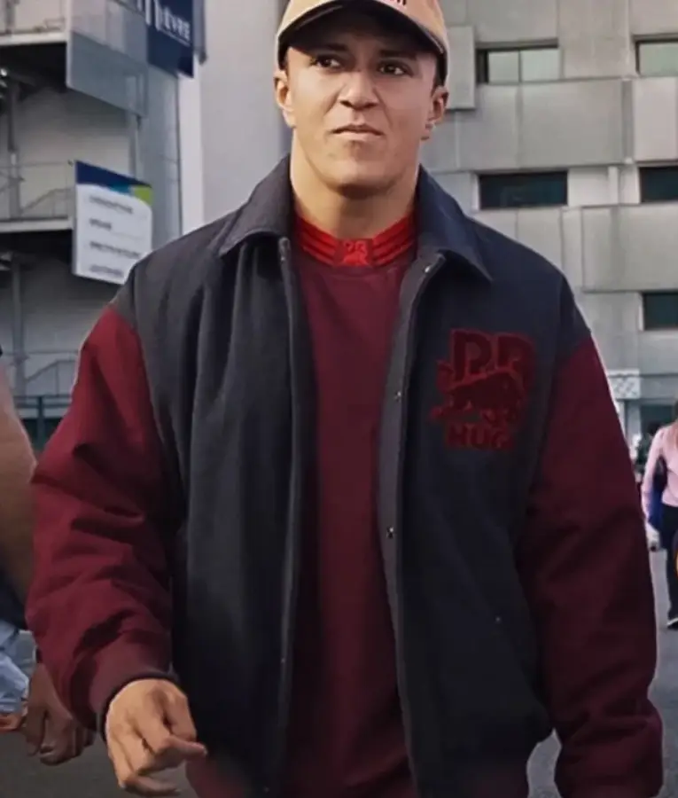 Isack Hadjar RB Varsity Jacket in navy and white, featuring Red Bull Racing logo detailing, ribbed cuffs and hem, and classic varsity-style buttons.