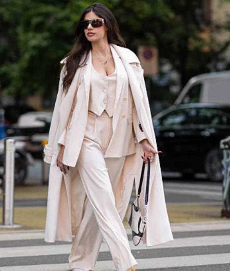 Ines Trocchia wearing a long coat during a Milan portrait session with elegant tailored fit and chic design