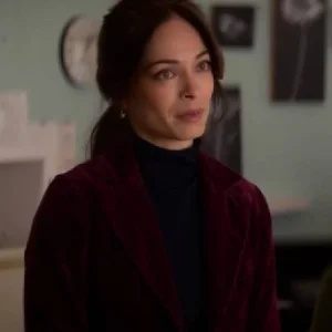“Velvet blazer inspired by Kristin Kreuk’s look in Murder in a Small Town laid flat for display.”