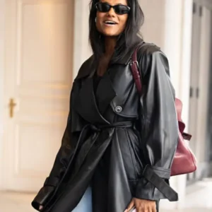 Simone Ashley wearing a long belted coat in Italy 2025 with tailored fit and elegant design