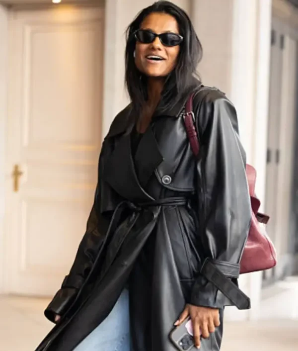 Simone Ashley wearing a long belted coat in Italy 2025 with tailored fit and elegant design