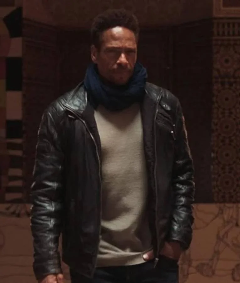 Gary Dourdan wearing a leather jacket in The Lost Princess, featuring a sleek black finish, zip-up front, and classic collar design.