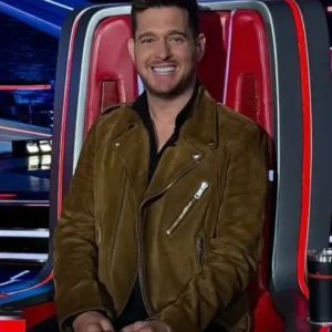 Michael Bublé wearing a brown leather jacket on The Voice Season 28, featuring a smooth finish, front zip closure, and classic collar design.