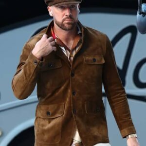 Travis Kelce wearing a luxurious cashmere suede military jacket featuring structured shoulders, buttoned front, and refined detailing.